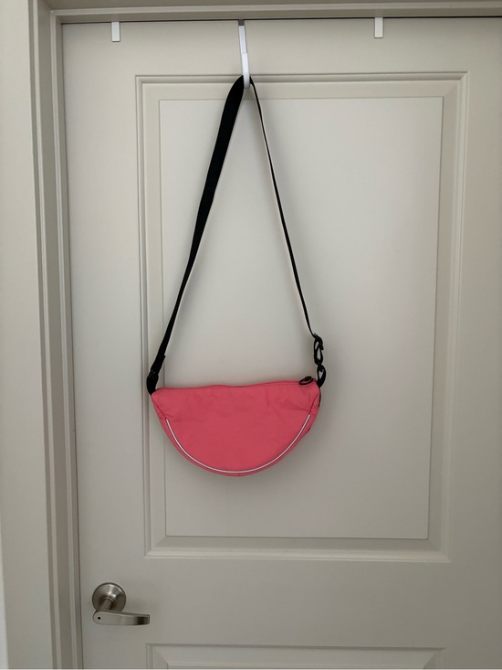 FP Movement by Free People Handbags - FP Movement by Free People Pink Crescent Crossbody with Black Strap